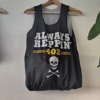 a black tank top that has been expertly upcycled into a bag