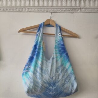 a blue and white tshirt bag on a hanger