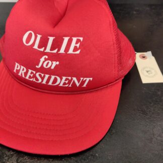 red Ollie for President hat on a black background